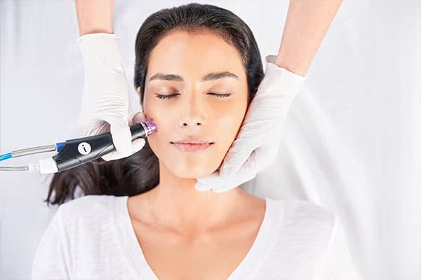 Young Woman Getting HydraFacial Treatment | Montecito Med Spa | Montecito, CA
